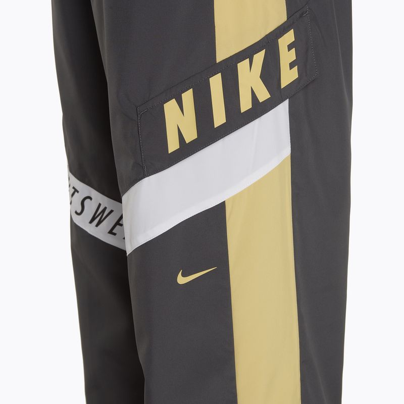 Spodnie damskie Nike Sportswear Woven High-Waisted dark smoke grey/saturn gold/white 3