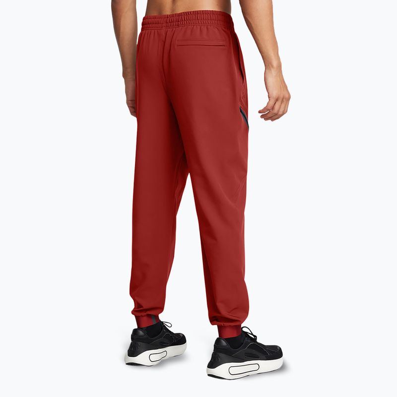 Spodnie męskie Under Armour Unstoppable Joggers earthen orange/black 3