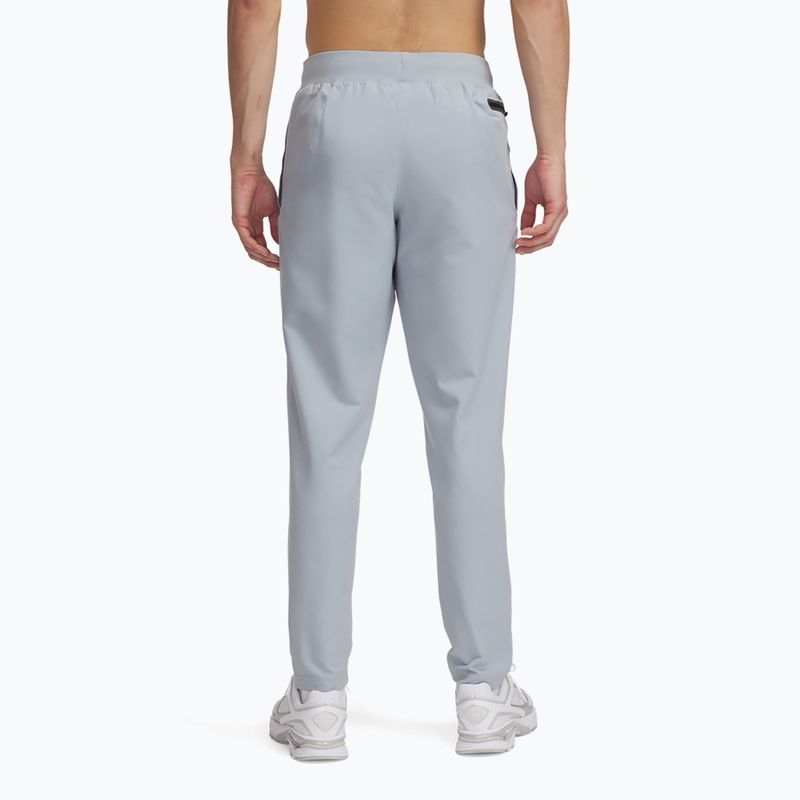 Spodnie treningowe męskie Under Armour Unstoppable Tapered harbor blue/black 3