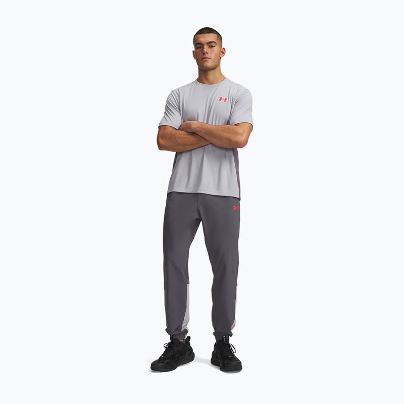 Spodnie treningowe męskie Under Armour Tech Utility Woven Pants castlerock/mod gray/racer red 2