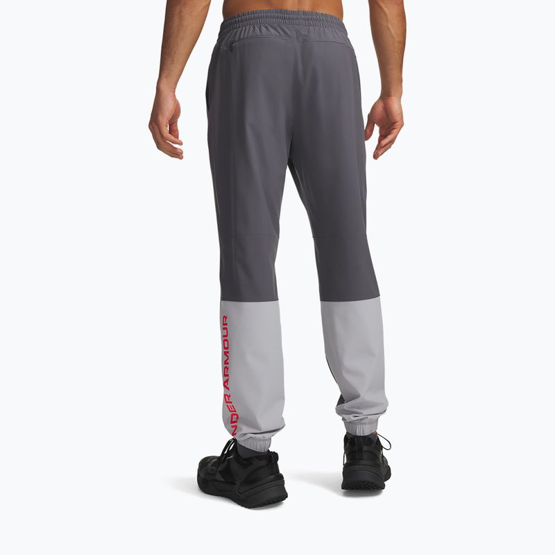 Spodnie treningowe męskie Under Armour Tech Utility Woven Pants castlerock/mod gray/racer red 3