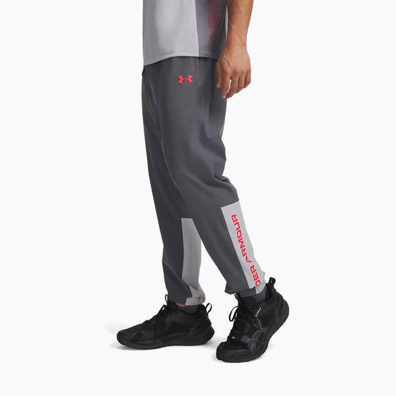 Spodnie treningowe męskie Under Armour Tech Utility Woven Pants castlerock/mod gray/racer red 4