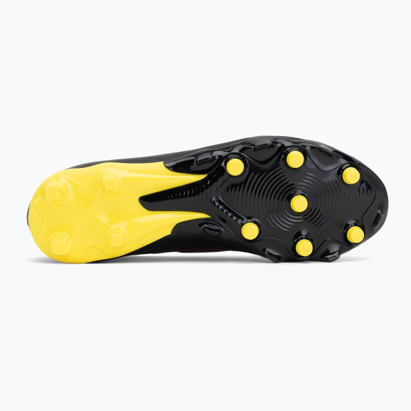 Buty piłkarskie dziecięce New Balance Tekela Team V5 black 100/punch yellow/fire cracker 4