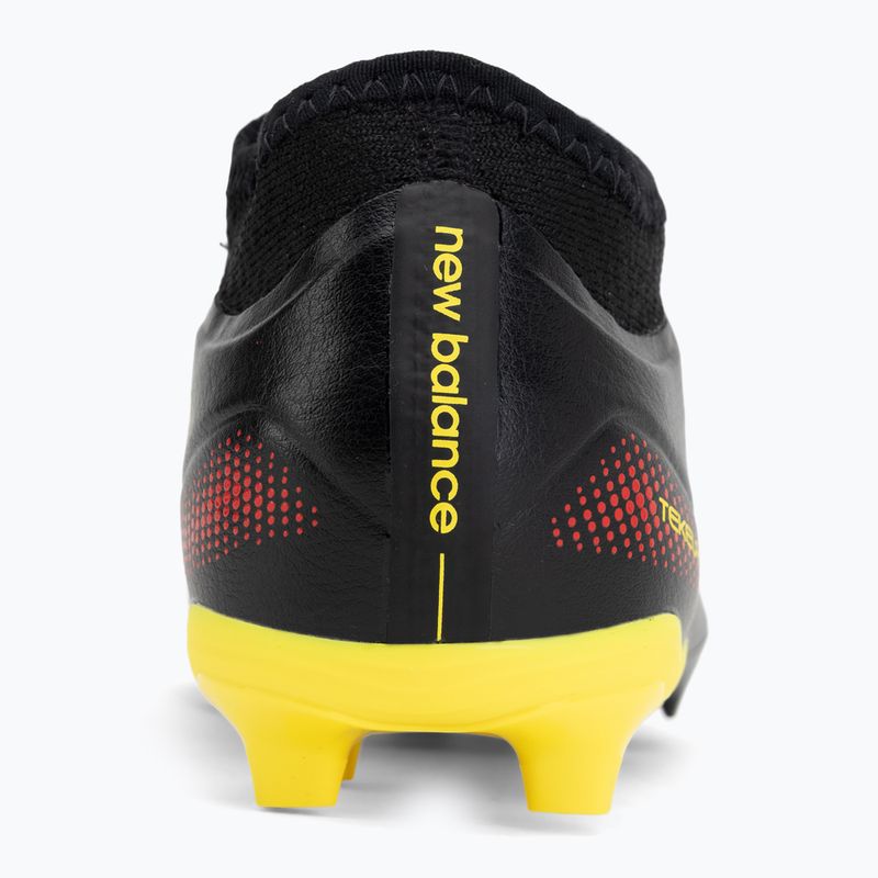 Buty piłkarskie dziecięce New Balance Tekela Team V5 black 100/punch yellow/fire cracker 6