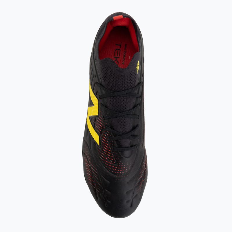 Buty piłkarskie New Balance Tekela Pro Low V5 FG black 100/punch yellow/fire cracker 5