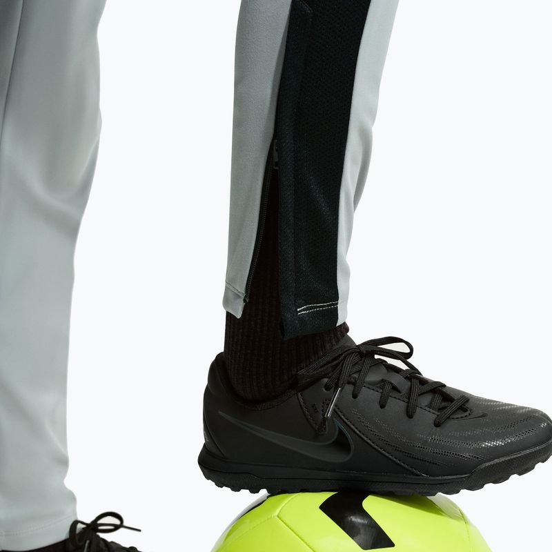 Spodnie dziecięce Nike Academy Dri-Fit Jr light smoke grey/white/black/metallic gold 7