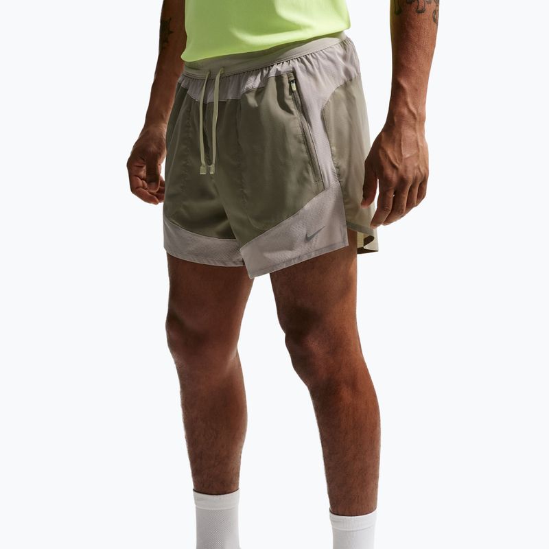 Spodenki do biegania męskie Nike Stride Dri-Fit Brief-Lined 5" light army/spruce fog