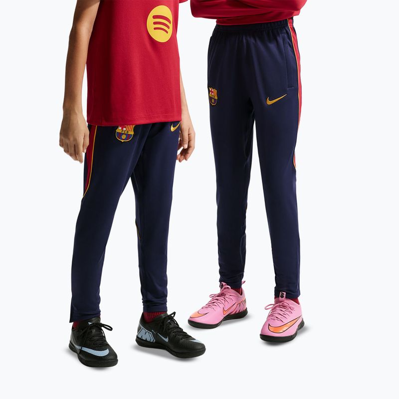 Spodnie piłkarskie dziecięce Nike FC Barcelona Strike Dri-Fit blackened blue/noble red/yellow