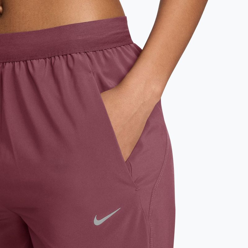 Spodnie damskie Nike Tempo pink smoke 3