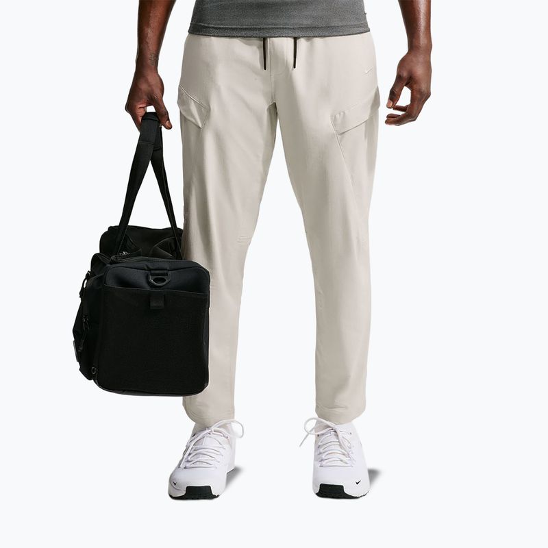 Spodnie męskie Nike Unlimited ight orewood brown/black/light orewood brown 7