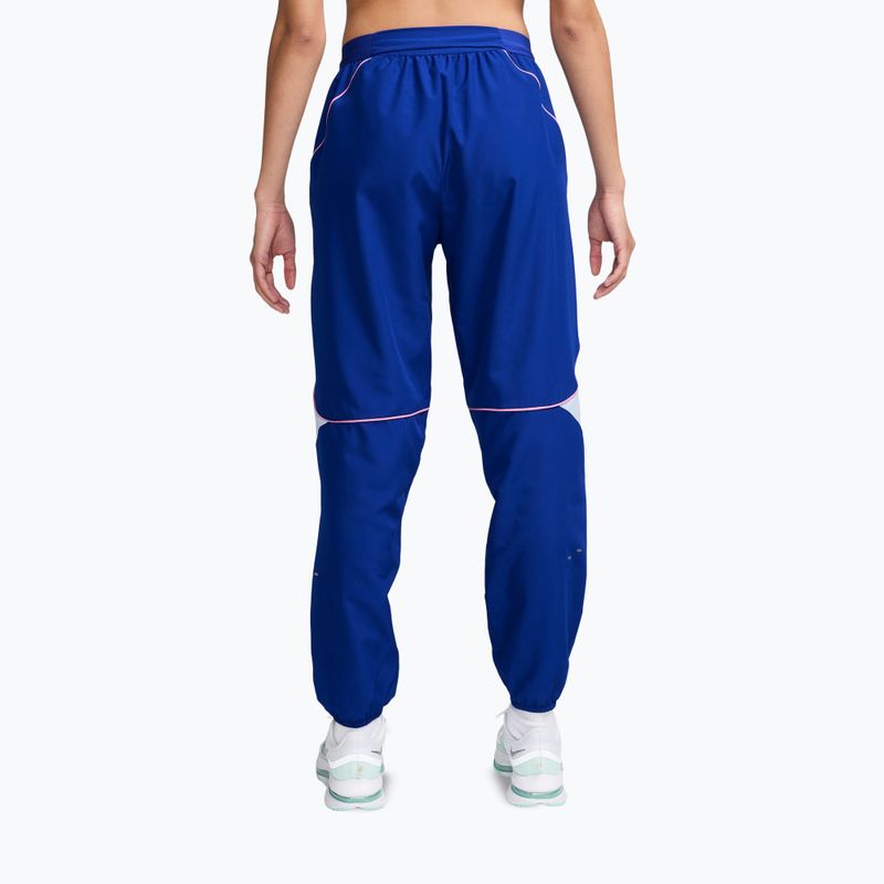 Spodnie damskie Nike Swoosh Dri-Fit old royal/football grey/pink rise 2