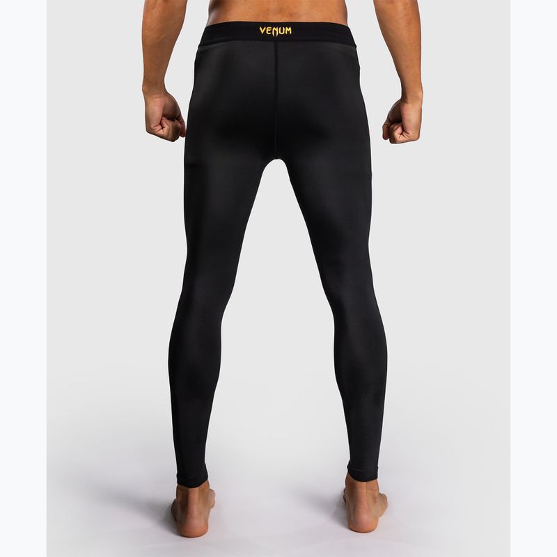 Legginsy treningowe męskie Venum G-Core Spats black/gold 3