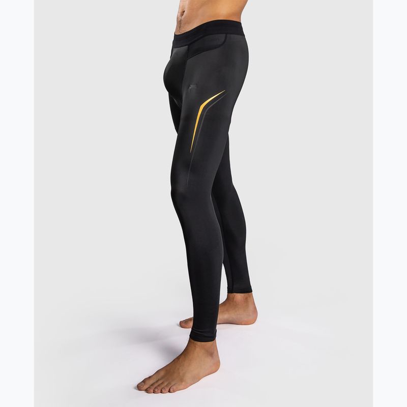 Legginsy treningowe męskie Venum G-Core Spats black/gold 4