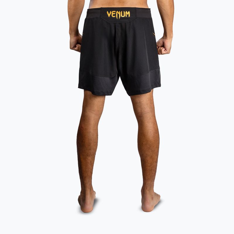Spodenki treningowe męskie Venum G-Core Fight black/gold 3