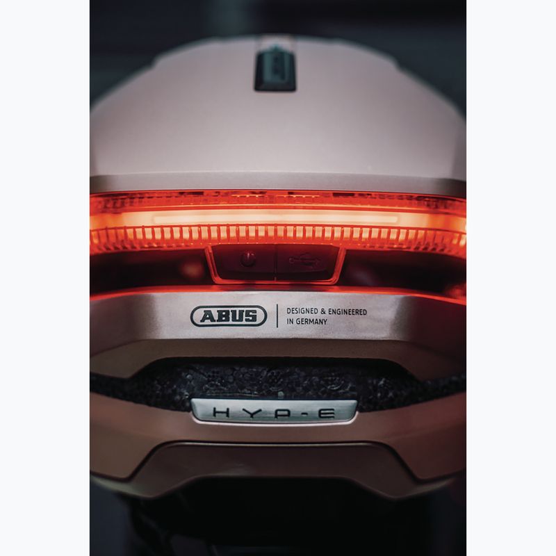 Kask rowerowy z kierunkowskazami ABUS Hyp-E champagne gold 9