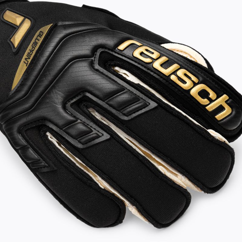 Rękawice bramkarskie Reusch Attrakt Gold X GluePrint Ortho-Tec black/gold 5