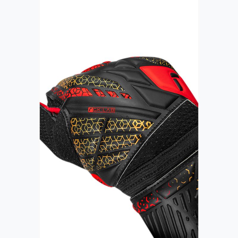 Rękawice bramkarskie Reusch Attrakt Solid black/gold/fiery red 6