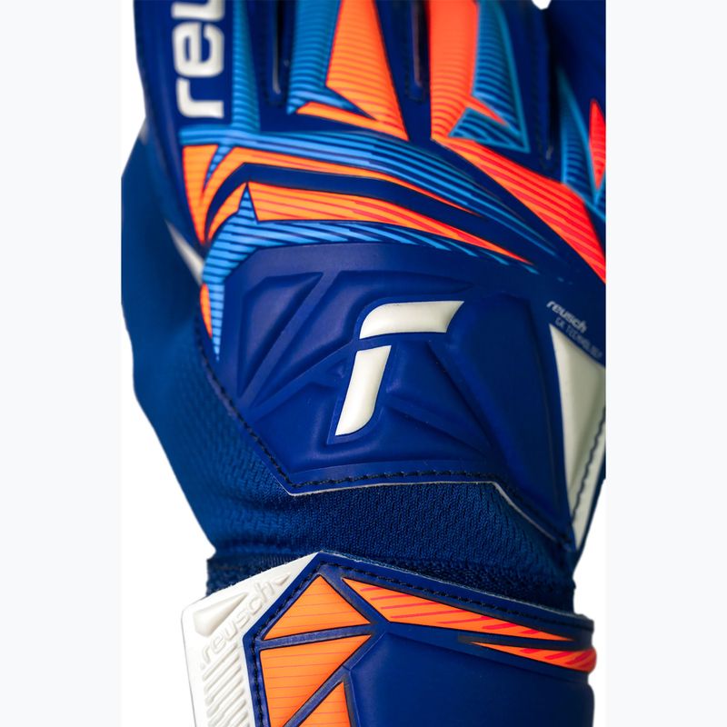 Rękawice bramkarskie dziecięce Reusch Attrakt Starter Solid Junior sharp blue/white/shocking orange 6