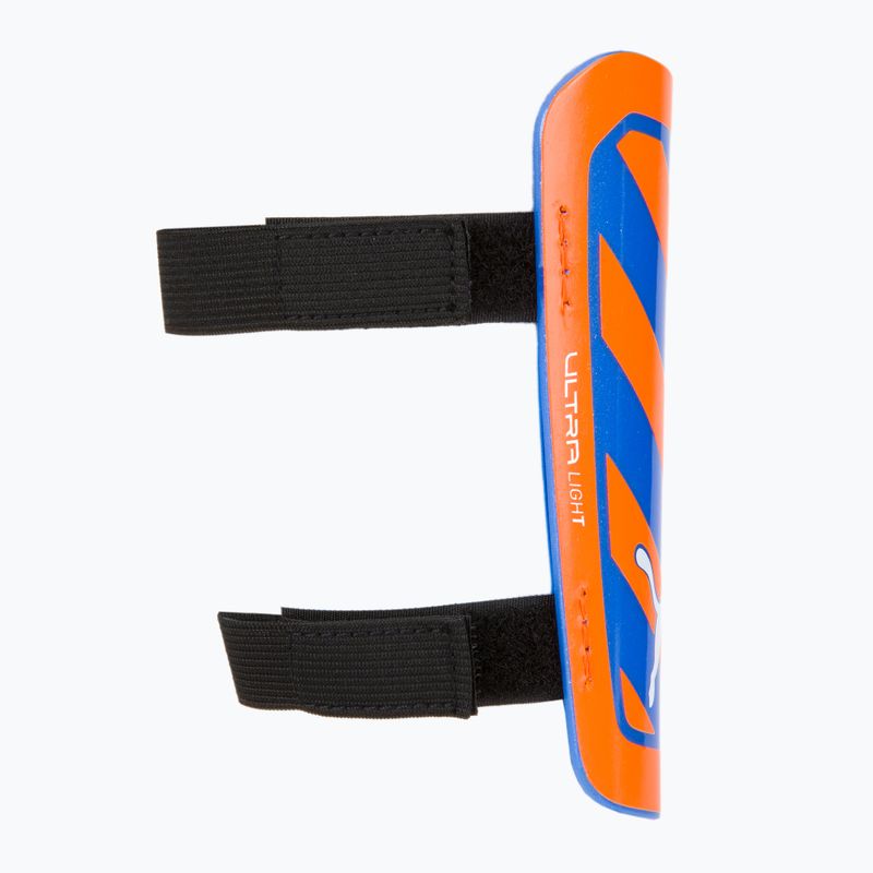 Ochraniacze na golenie PUMA Ultra Light Strap ultra orange/blue glimmer 2