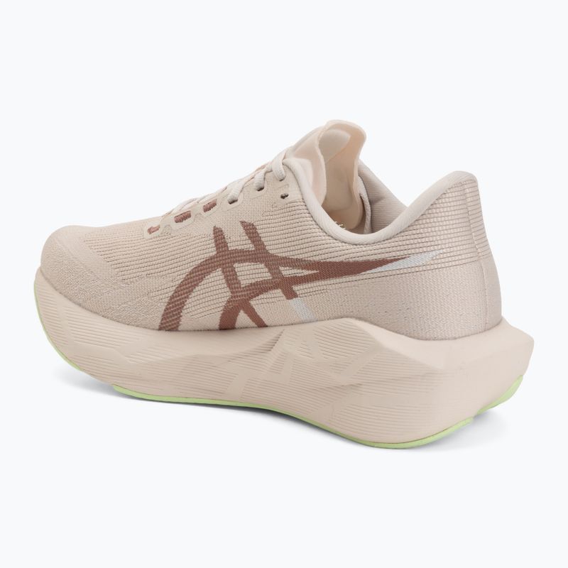 Buty do biegania damskie ASICS Novablast 6 rose dust/illuminate yellow 3