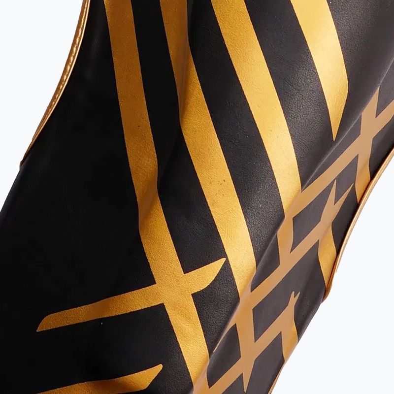 Ochraniacze piszczeli i stóp StormCloud Lynx black/gold 6