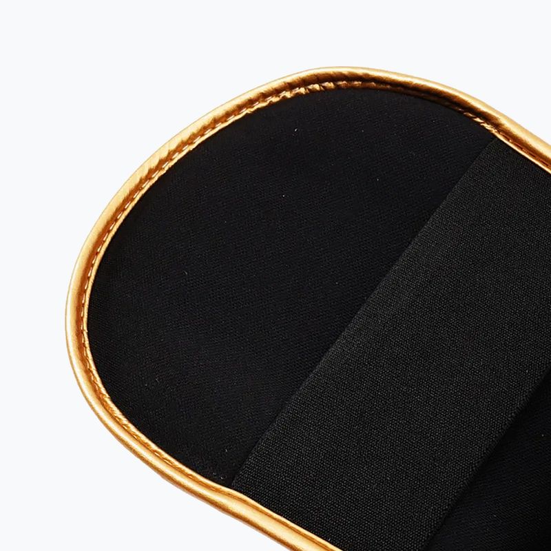 Ochraniacze piszczeli i stóp StormCloud Lynx black/gold 8