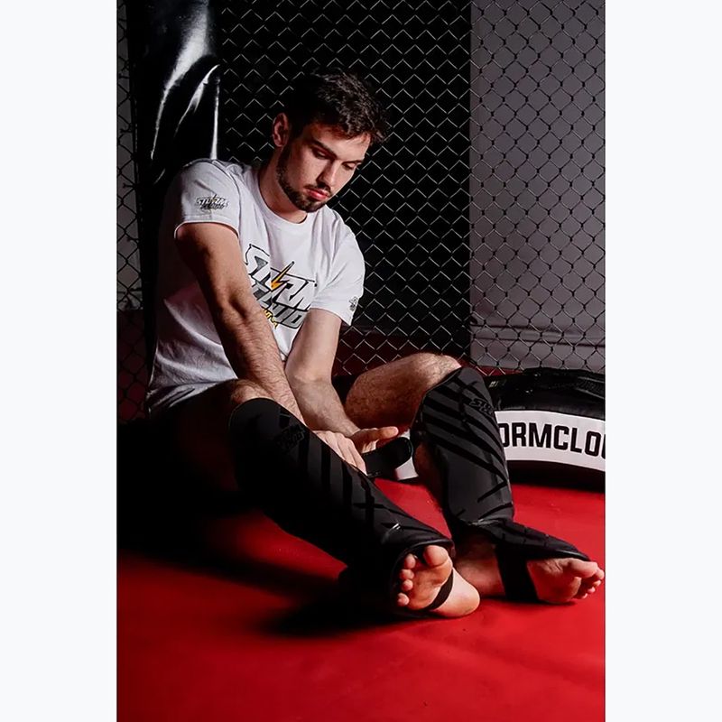 Ochraniacze piszczeli i stóp StormCloud Lynx black/black 9