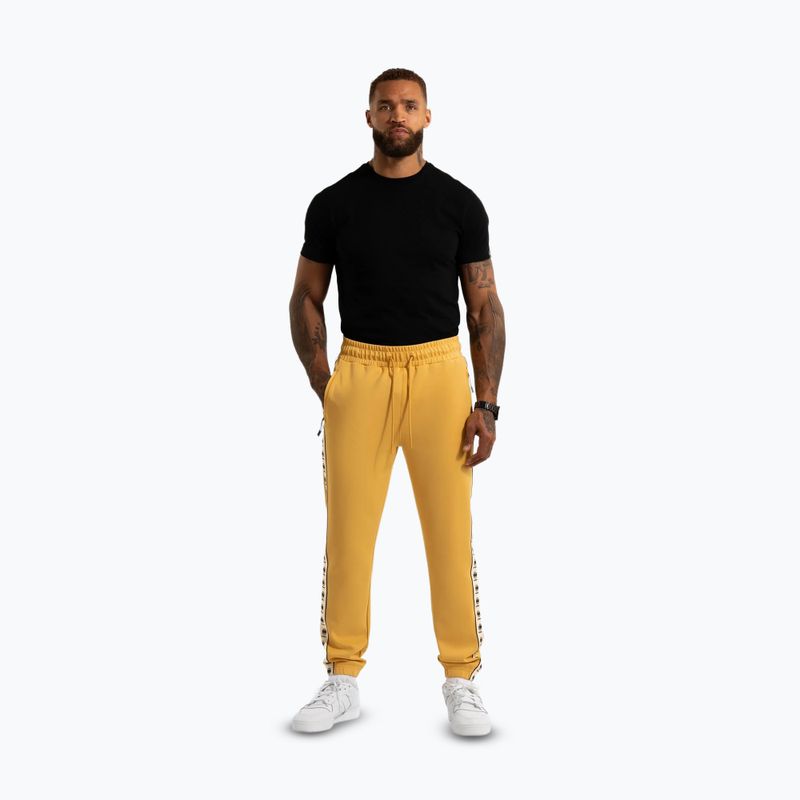 Spodnie męskie Pitbull Track Pants Powers pale yellow 2