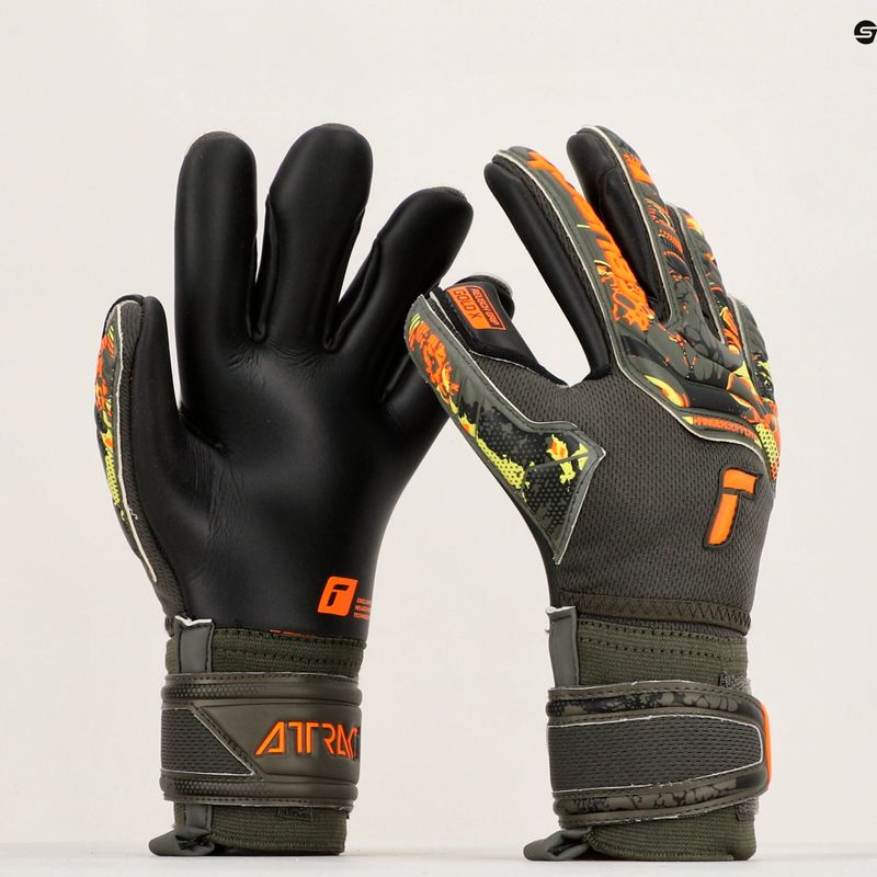 Rękawice bramkarskie dziecięce Reusch Attrakt Gold X Finger Support desert green/shock orange/black 11