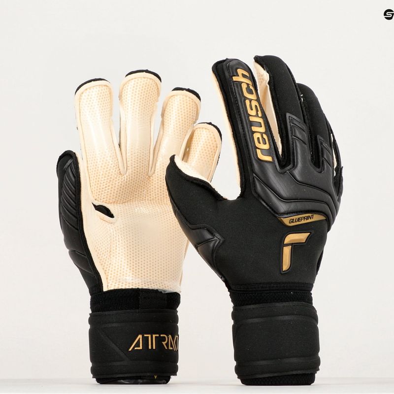 Rękawice bramkarskie Reusch Attrakt Gold X GluePrint Ortho-Tec black/gold 9