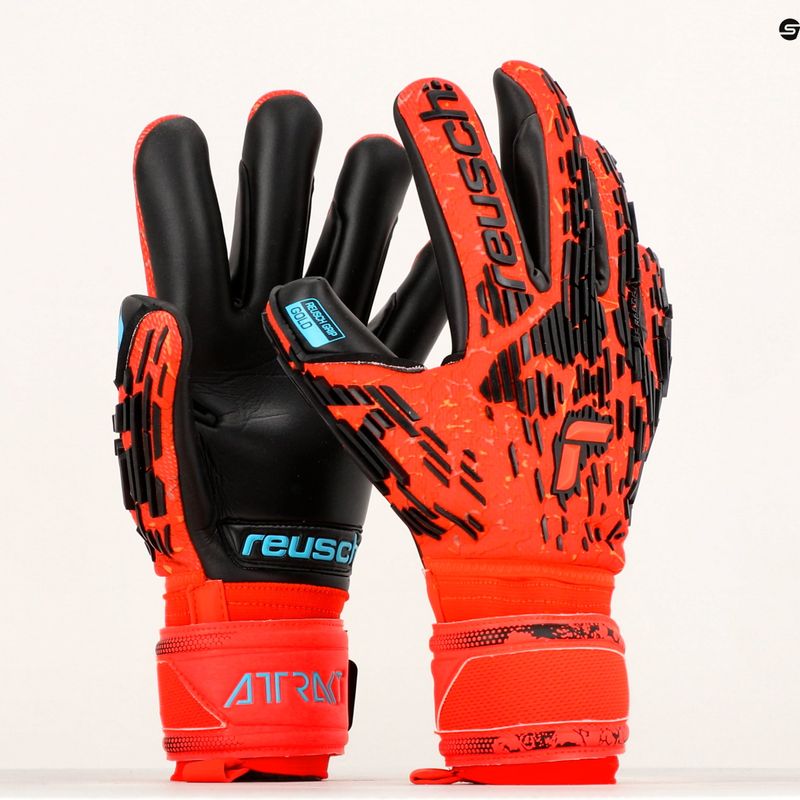 Rękawice bramkarskie Reusch Attrakt Freegel Gold Finger Support bright red/future blue/black 9