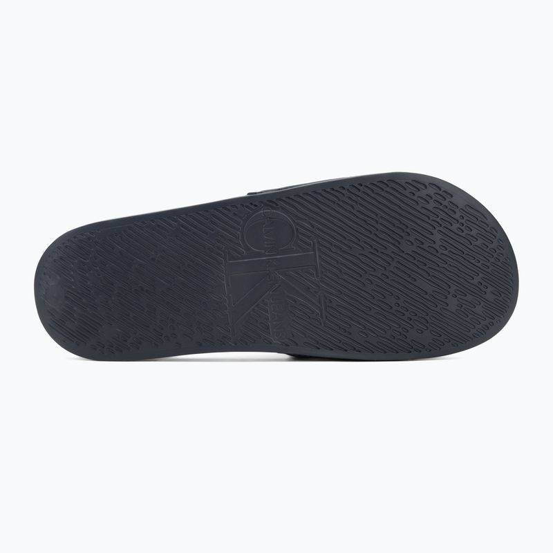 Klapki męskie Calvin Klein YM0YM01271 Slide Monogram Cv triple calvin navy 4