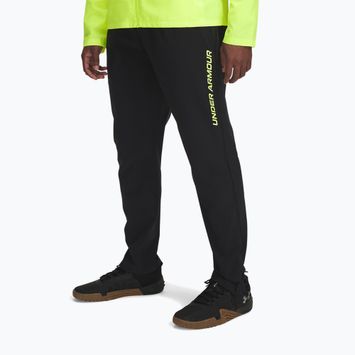 Spodnie do biegania męskie Under Armour Storm Run black/high vis yellow/reflective