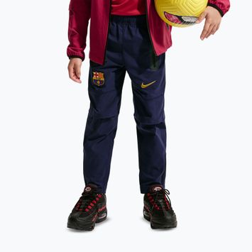 Spodnie piłkarskie dziecięce Nike FC Barcelona Tech Woven blackened blue/black/mineral yellow